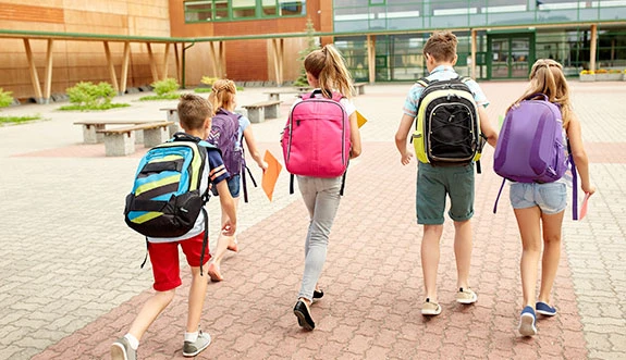 Are Children's Backpack Weight Limits Enough? A Critical Rewiew of the Relevant Literature